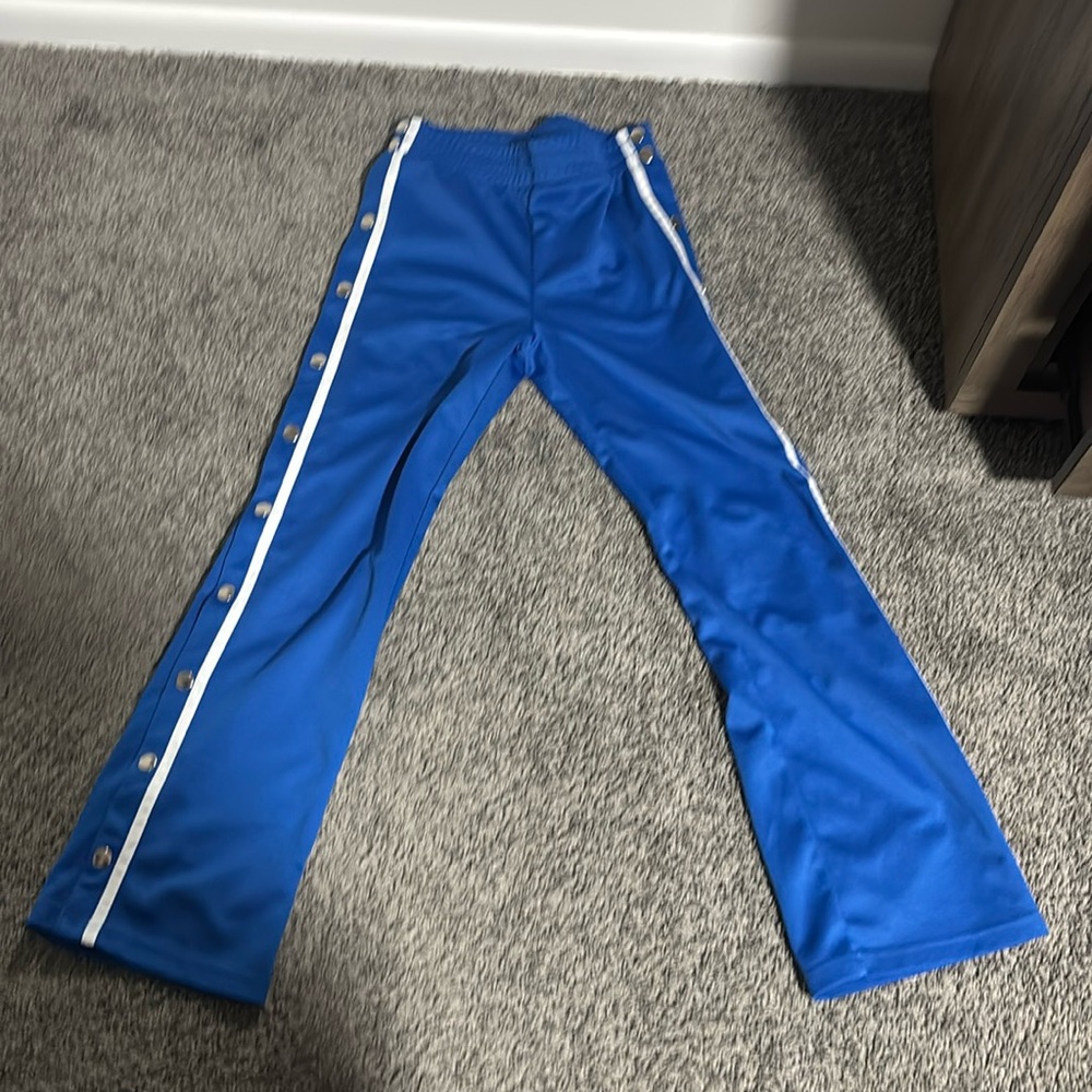 Blue track pants size small women’s with buttons on the side